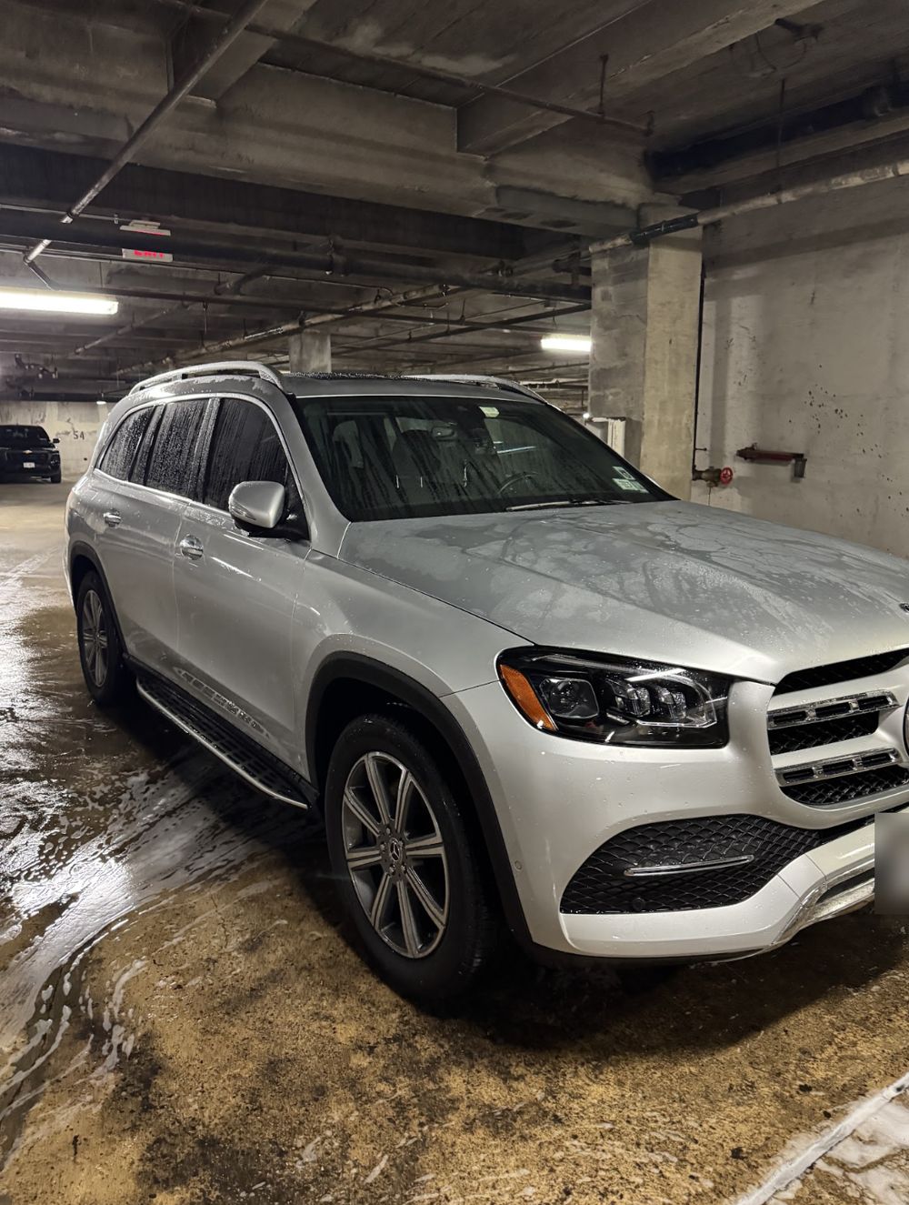 Silver Mercedes-Benz GLS after an exterior wash
